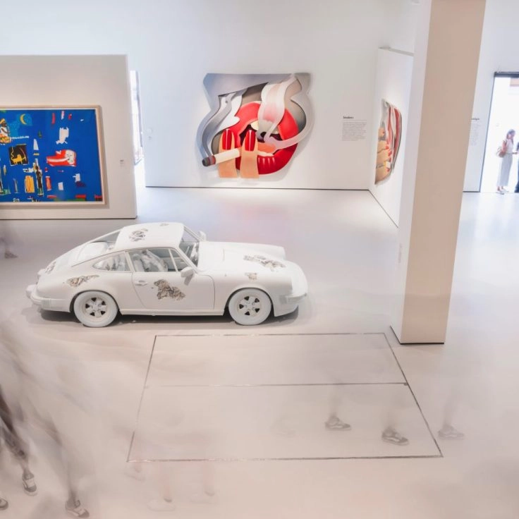 Room at Moco Museum London with contemporary art.